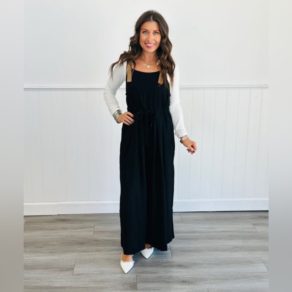 Black jumpsuit faux leather straps